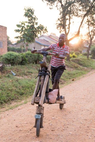Kihihi-Wooden-Pushbike-kid-Uganda.